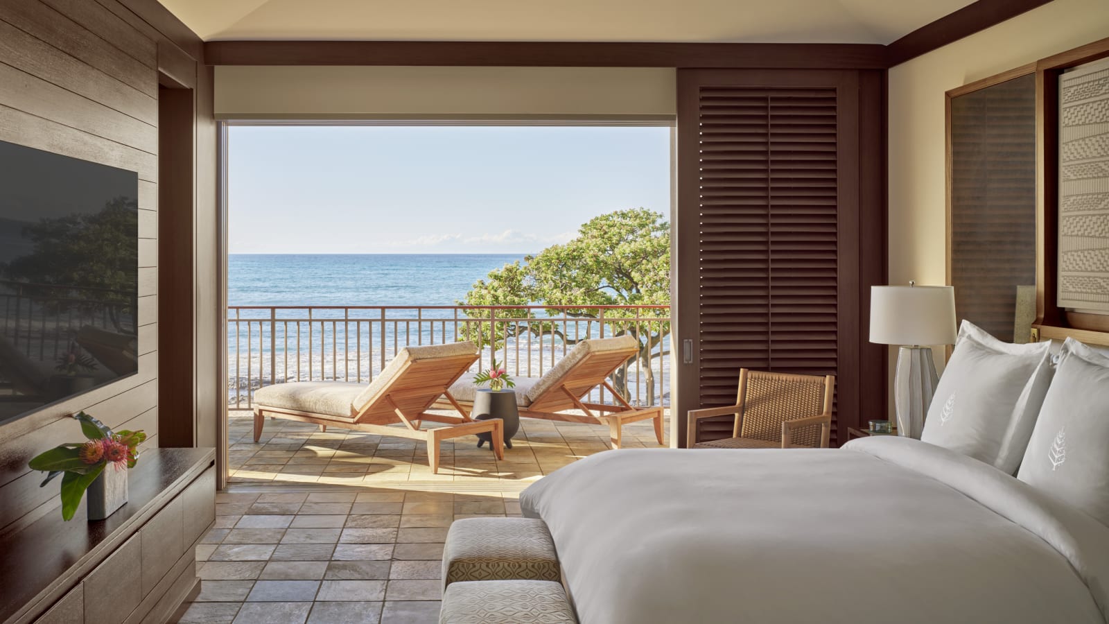 A bedroom lanai looking straight out to the water