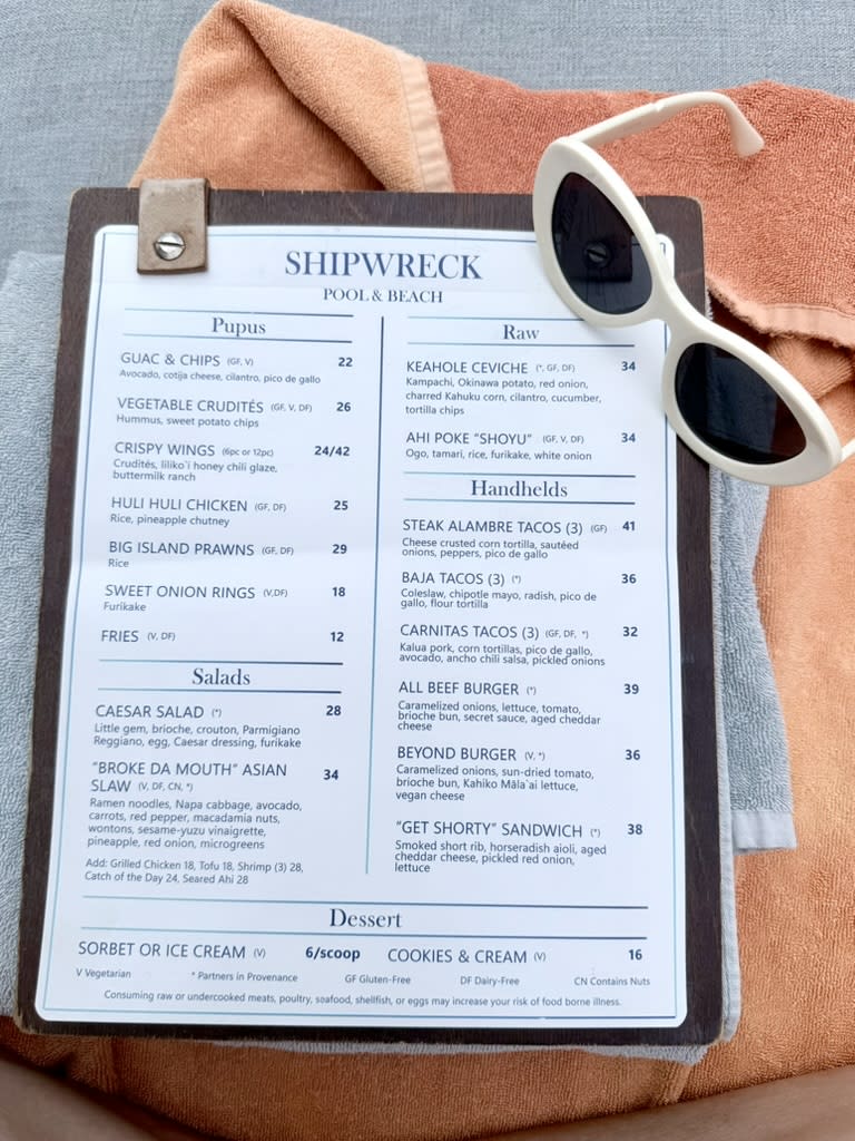 The Shipwreck Bar and Sushi menu, built into the resort founder's restored schooner